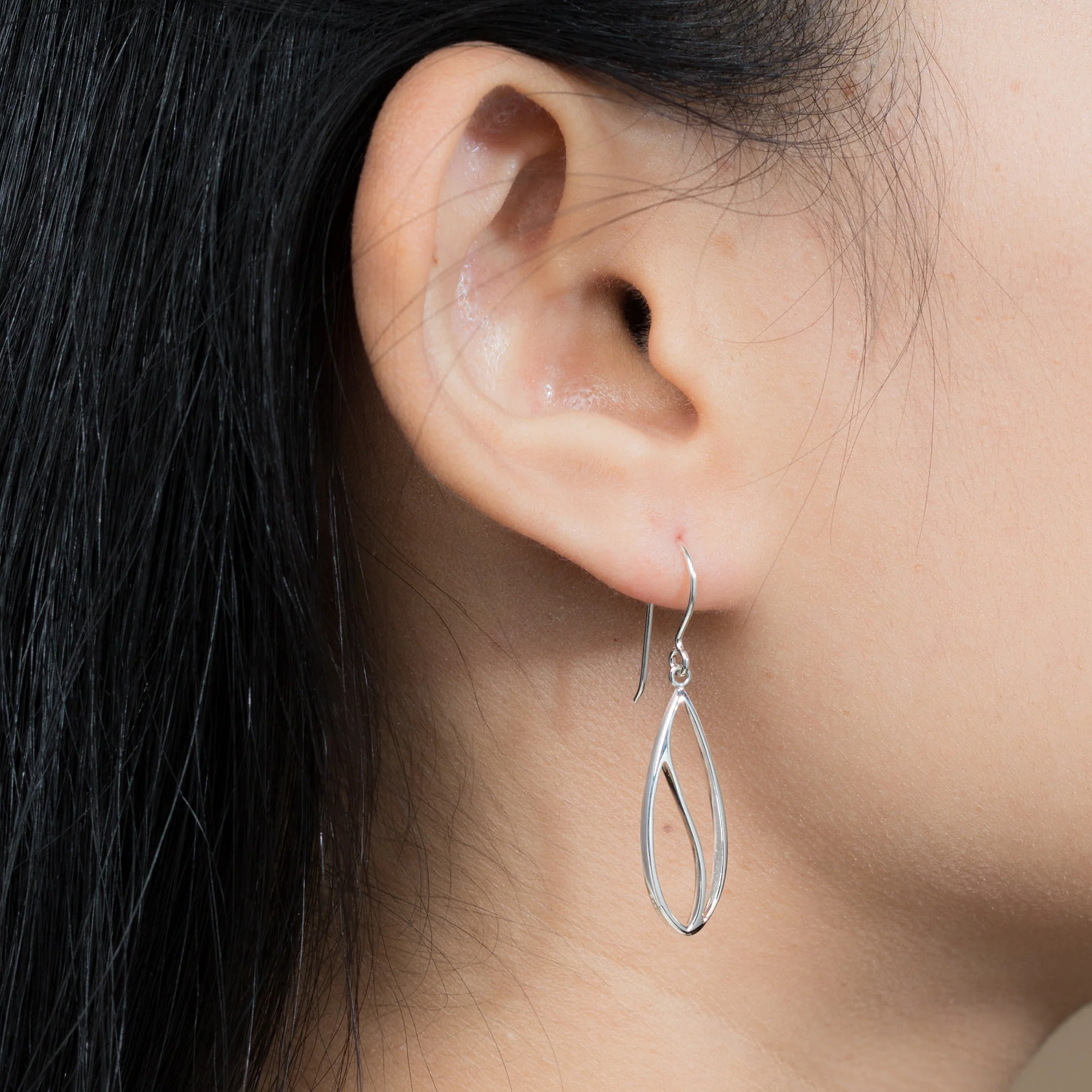 Long Modern Leaf Outline Dangle Earrings - Image 2